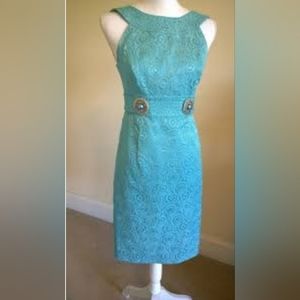 Muse turquoise dress with 80's vibe